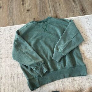 women’s green sweatshirt